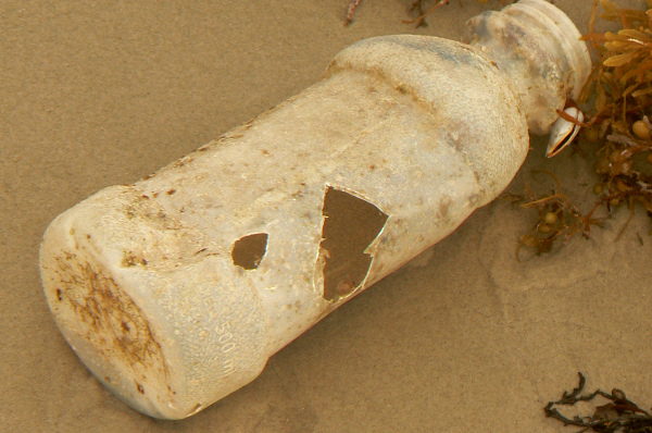 Plastikflasche am Strand von Texas